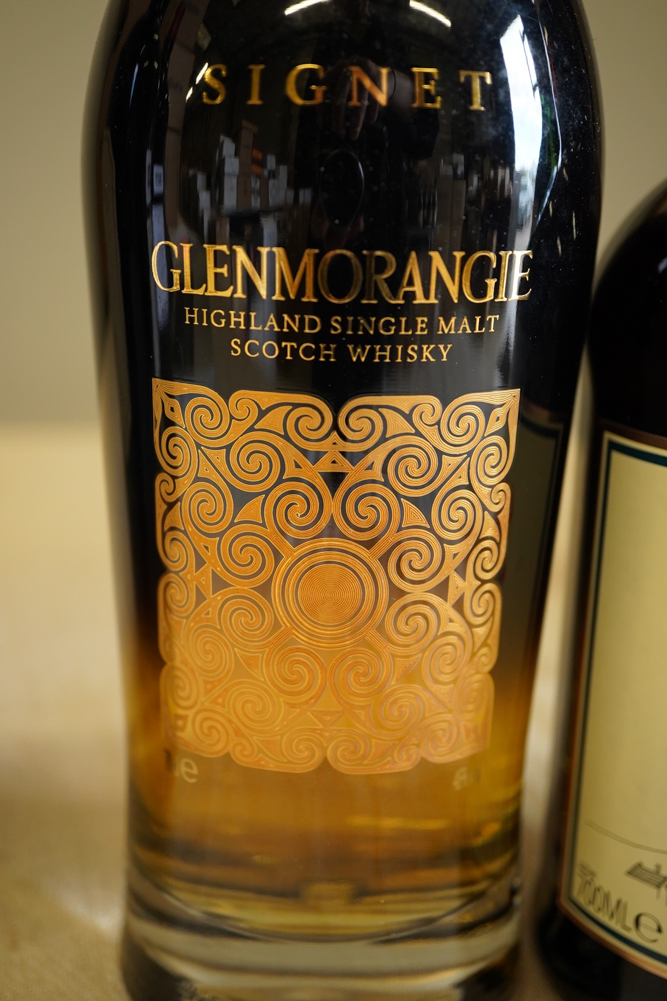 Whisky: 1 x Glenmorangie Signet, 46% abv, 70cl; 1 x Glenfarclas Single Malt 25 year old, 43% abv, 70cl (2)
